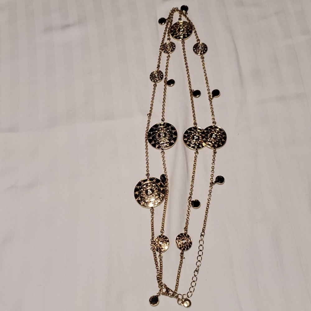 Long gold tone necklace